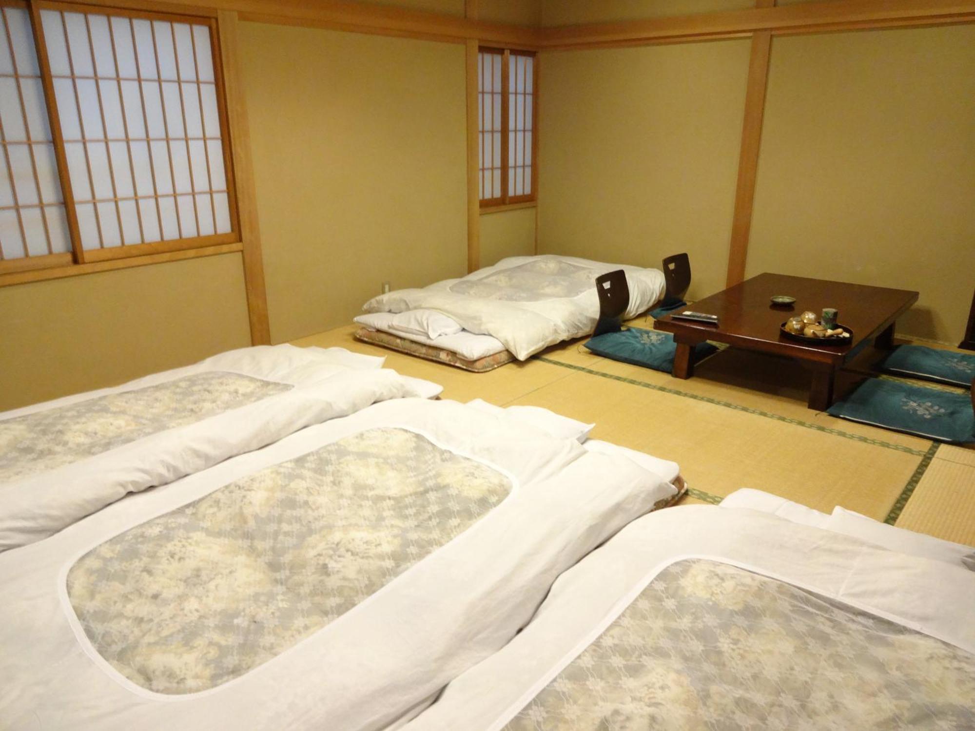 Chuokan Shimizuya Ryokan Наґано Номер фото