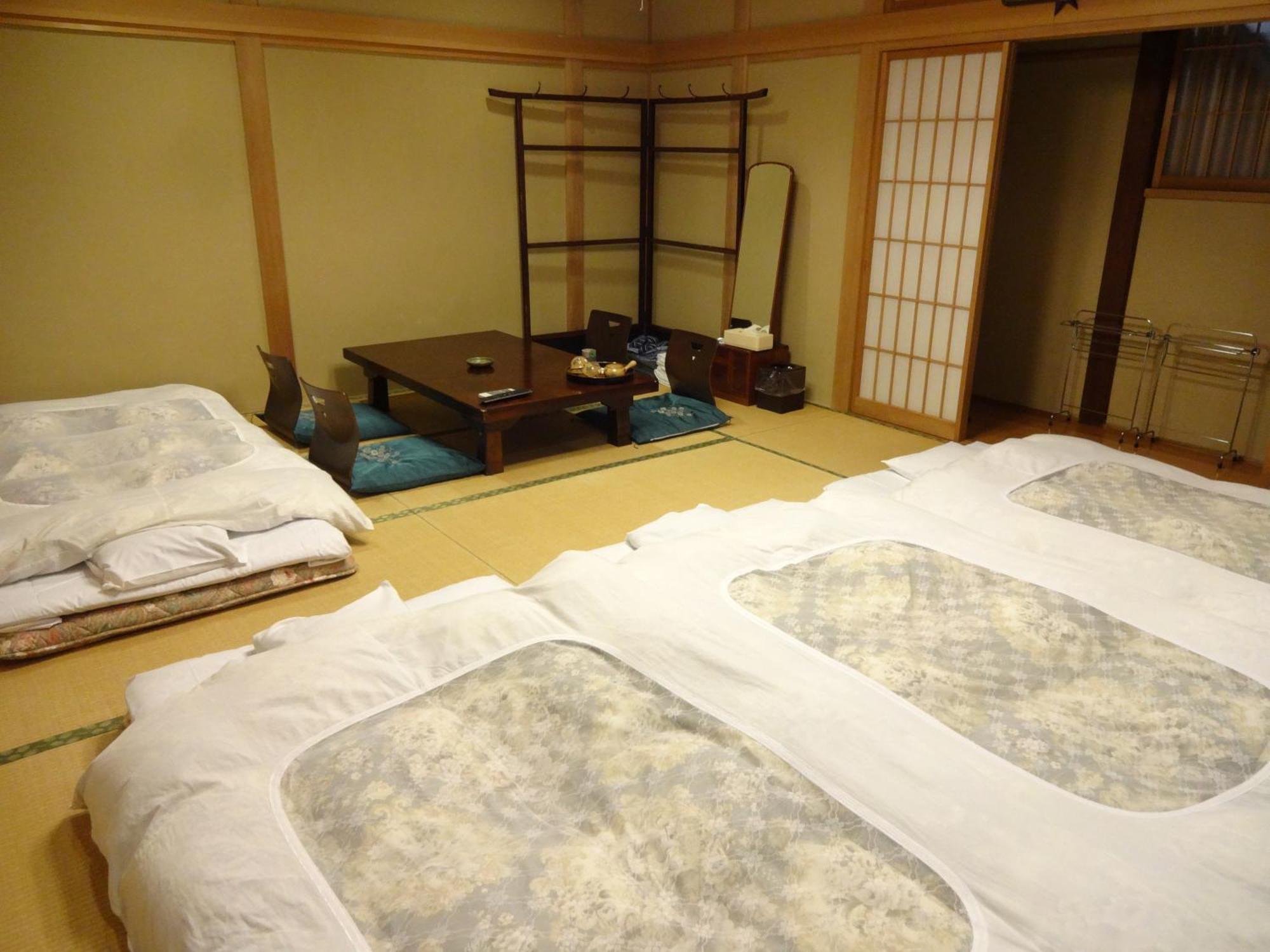 Chuokan Shimizuya Ryokan Наґано Номер фото